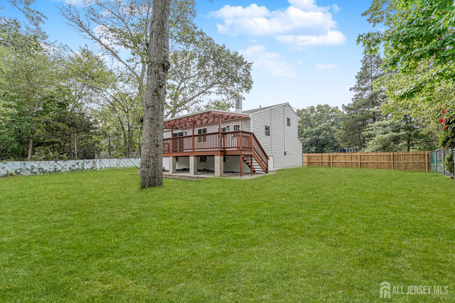 20 Daniel Road Spotswood, NJ 08884 - Photo 28 of 29 a view of a house with a backyard