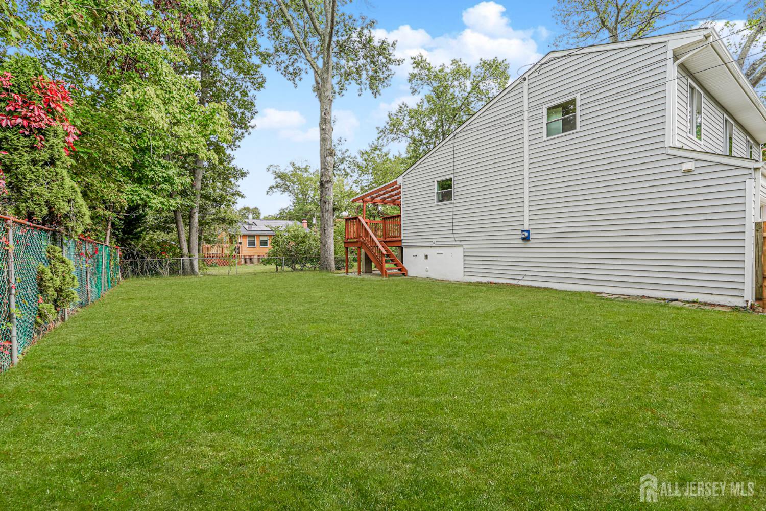 20 Daniel Road Spotswood, NJ 08884 - Photo 29 of 29 a view of a backyard with large tree