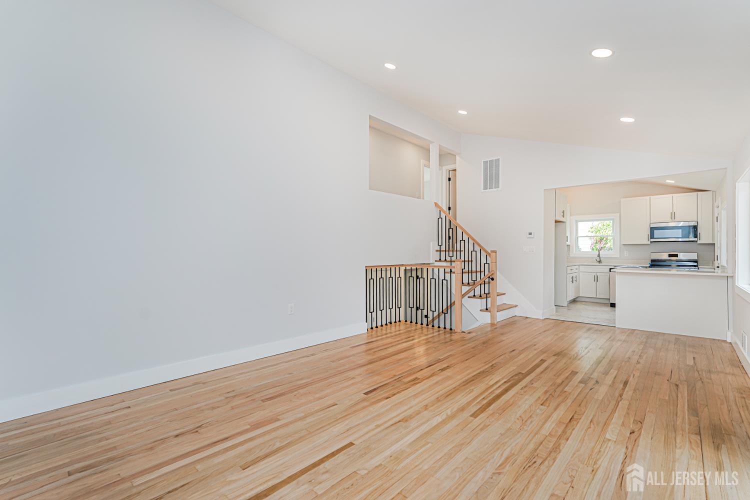 20 Daniel Road Spotswood, NJ 08884 - Photo 8 of 29 a view of empty room with wooden floor