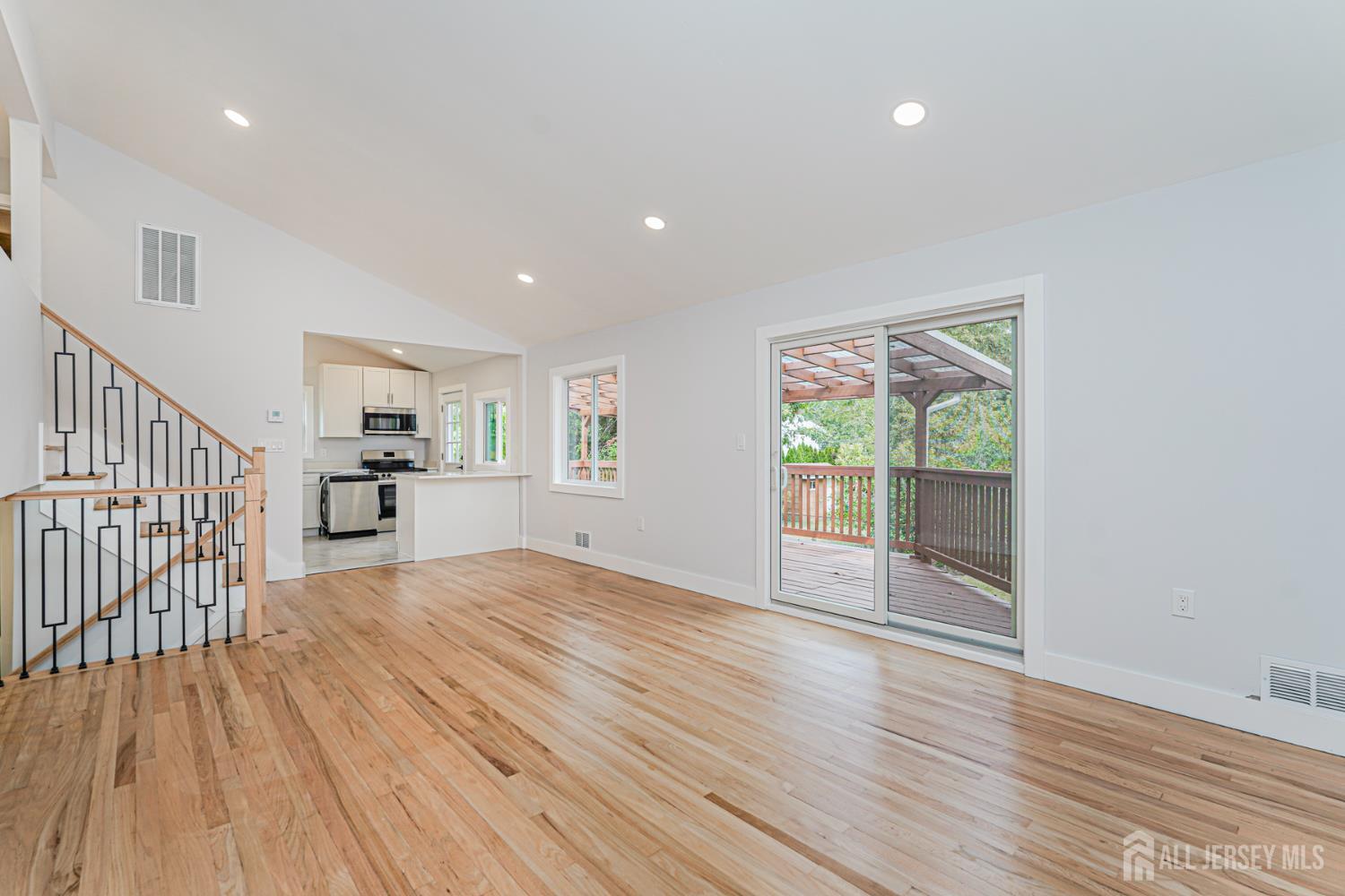20 Daniel Road Spotswood, NJ 08884 - Photo 9 of 29 a view of empty room with wooden floor and fan