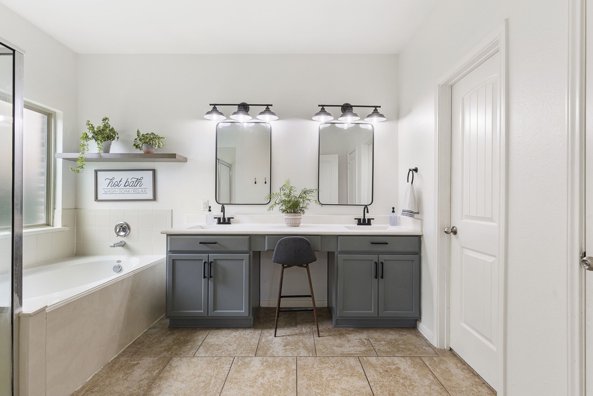 22810 Dale River Road Tomball, TX 77375 - Photo 19 of 44 Primary bathroom with double sinks and a huge walk-in closet.