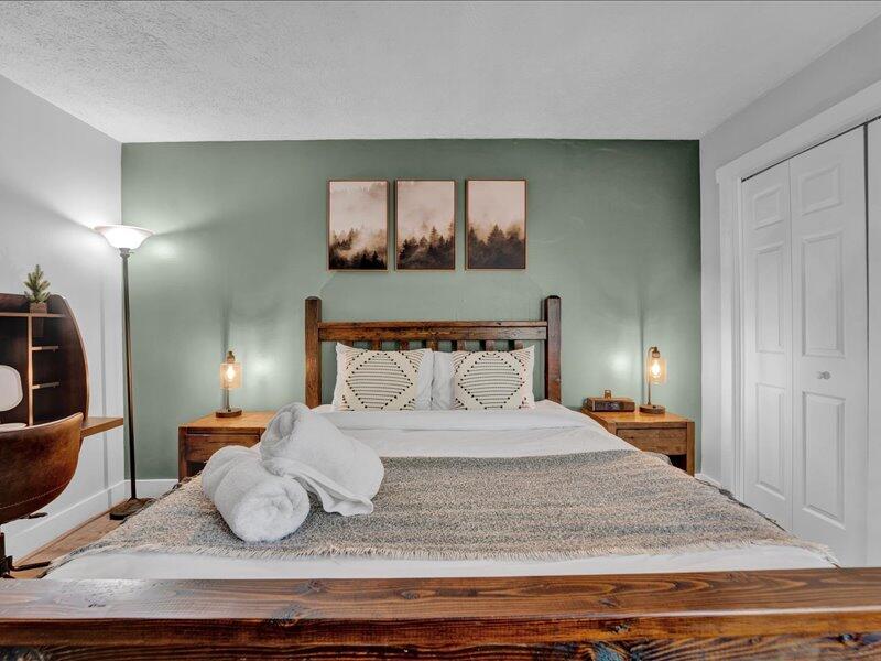 216 Snow Ridge Cir Lake Lake Harmony, PA 18624 - Photo 17 of 43 a bedroom with a bed and wooden floor