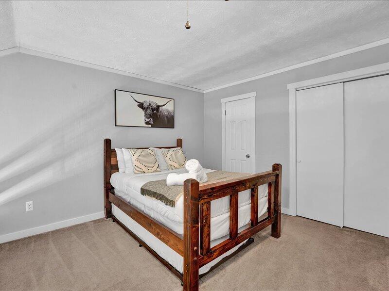 216 Snow Ridge Cir Lake Lake Harmony, PA 18624 - Photo 22 of 43 a view of a bedroom with bed and cabinet