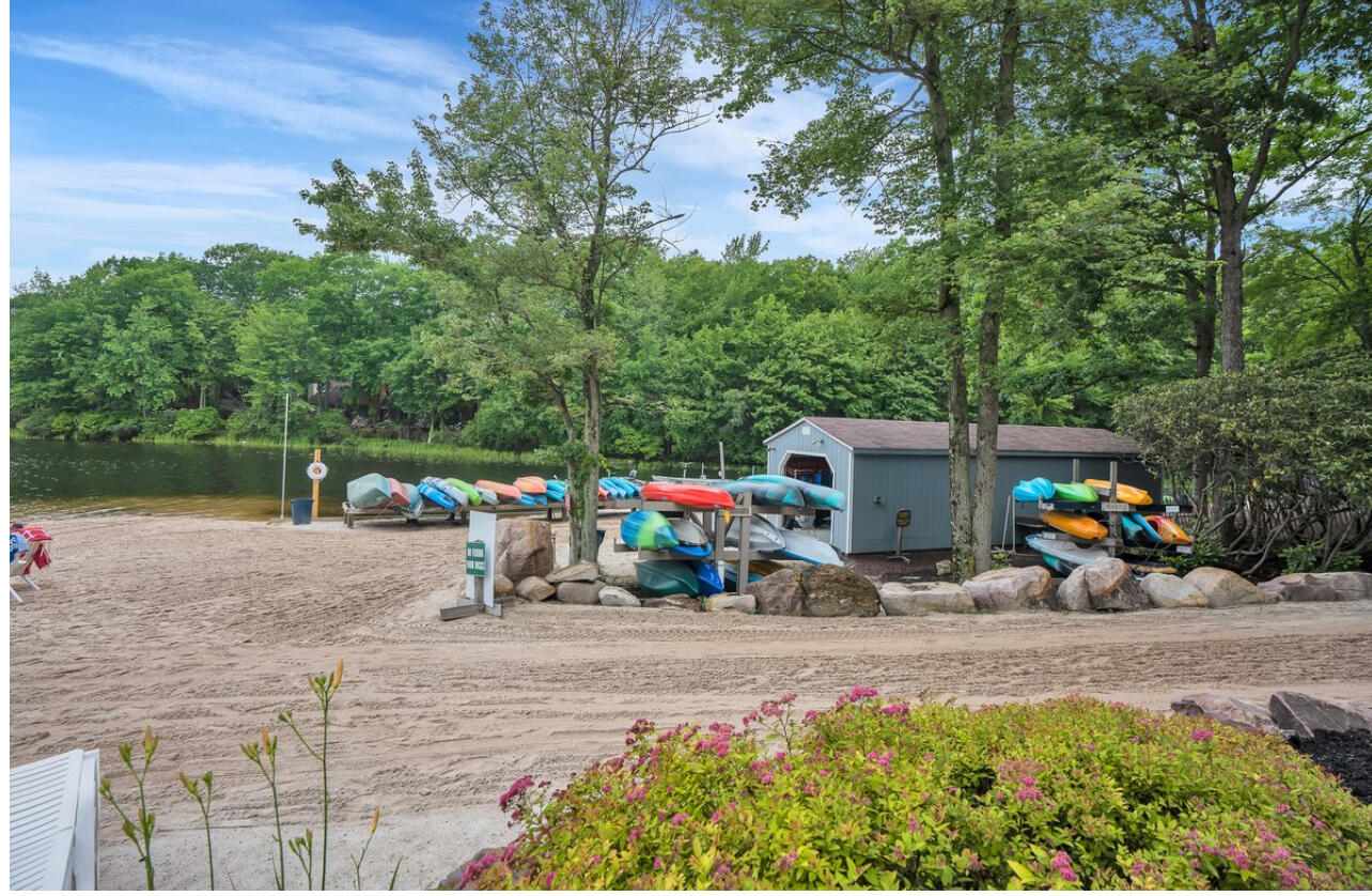 216 Snow Ridge Cir Lake Lake Harmony, PA 18624 - Photo 40 of 43 a view of a parked cars in front of a house