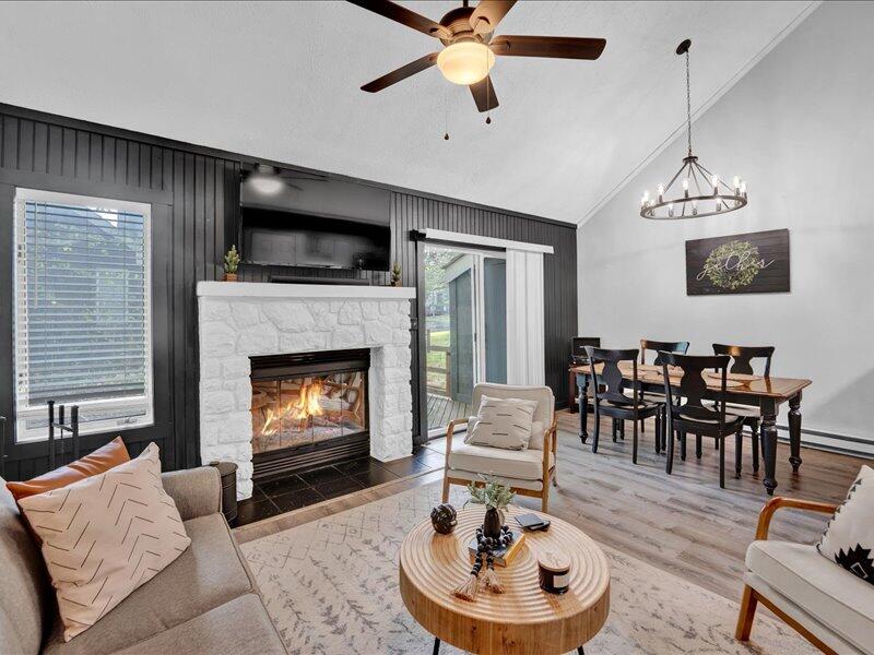 216 Snow Ridge Cir Lake Lake Harmony, PA 18624 - Photo 5 of 43 a living room with furniture and a fireplace