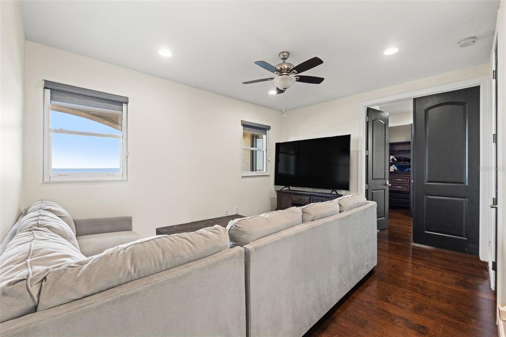 4387 Harborpointe Drive Port Richey, FL 34668 - Photo 35 of 46 a living room with furniture and a flat screen tv