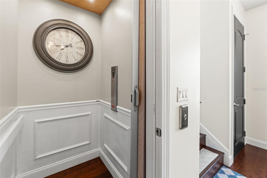 4387 Harborpointe Drive Port Richey, FL 34668 - Photo 8 of 46 a view of a hallway with elevator