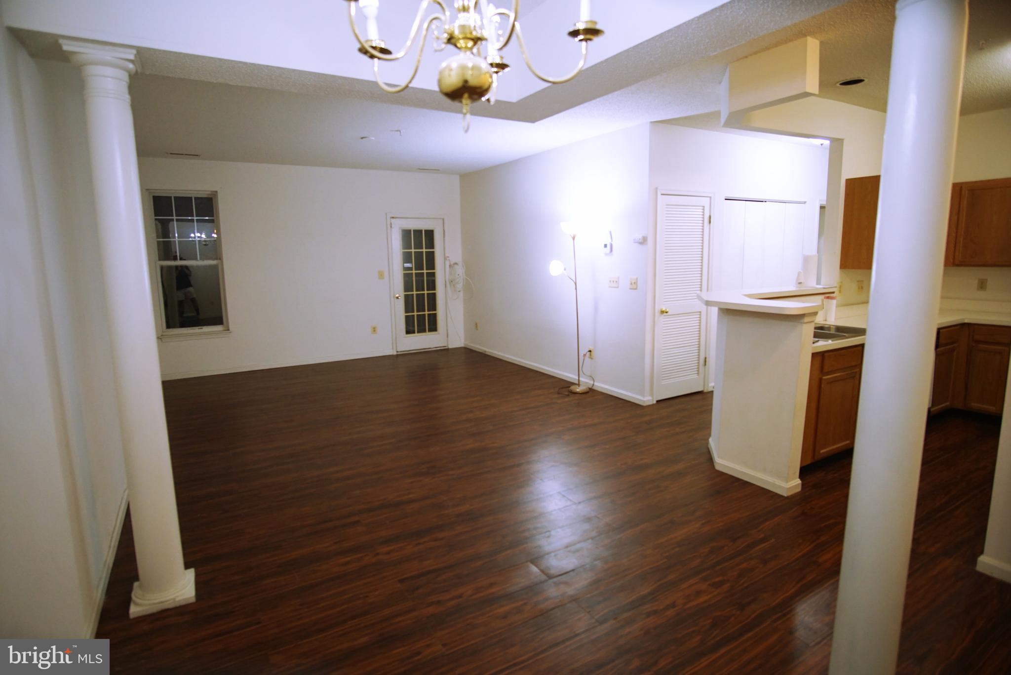 7115 Sandown Circle, Unit 202 Windsor Mill, MD 21244 - Photo 22 of 58 a view of an empty room with closet and a window
