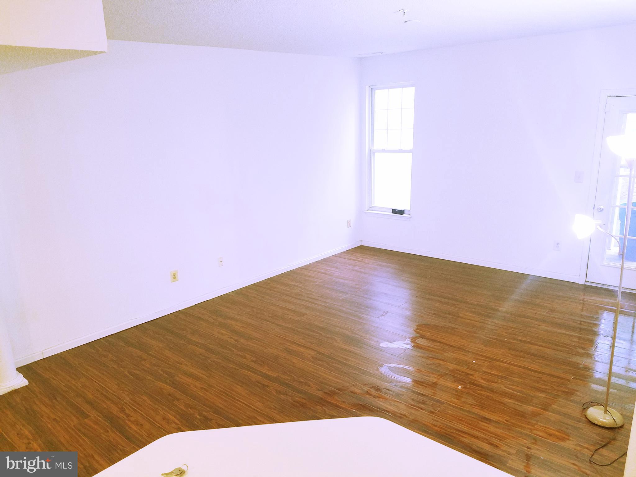 7115 Sandown Circle, Unit 202 Windsor Mill, MD 21244 - Photo 3 of 58 a view of an empty room