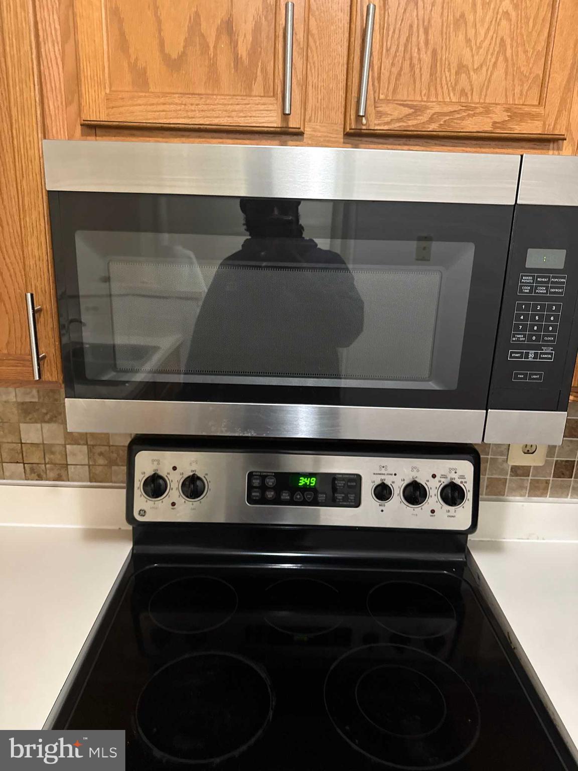 7115 Sandown Circle, Unit 202 Windsor Mill, MD 21244 - Photo 33 of 58 a close view of stove top oven