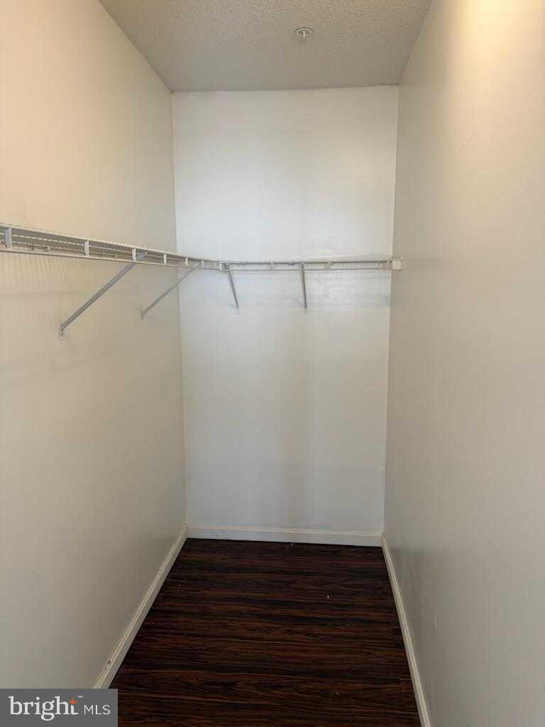 7115 Sandown Circle, Unit 202 Windsor Mill, MD 21244 - Photo 34 of 58 a view of a room with racks on the wall