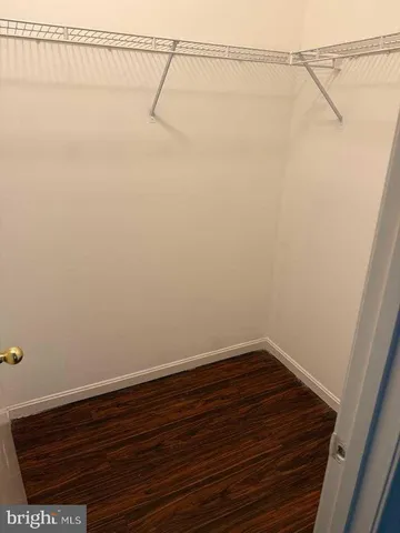 a view of a big room with an empty door