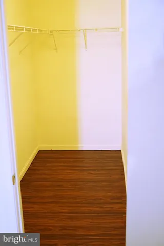 a balcony with table and chairs