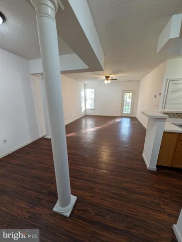 a view of balcony with wooden floor