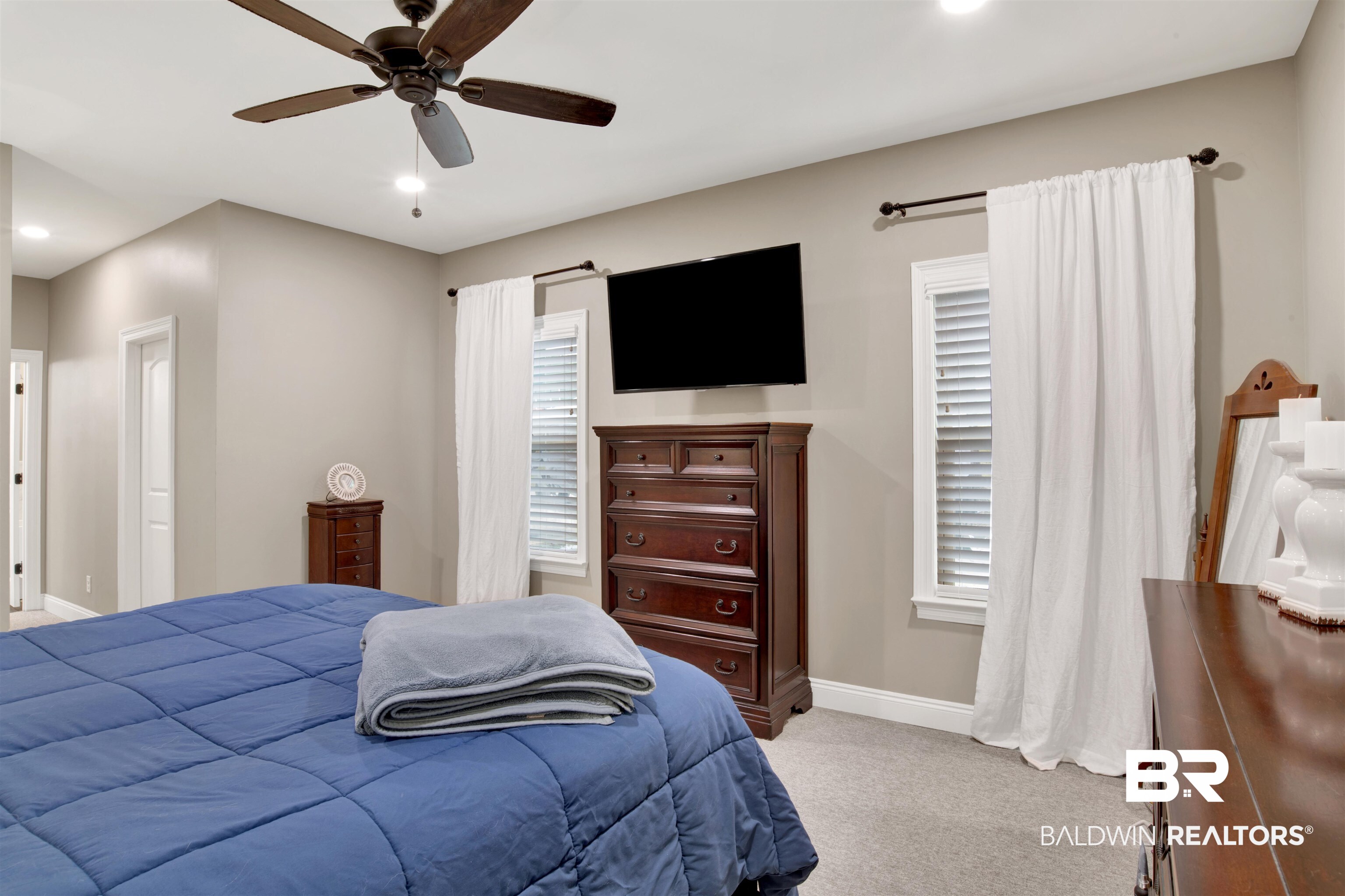 2440 Johnson Road West Mobile, AL 36695 - Photo 30 of 40 Bedroom with ceiling fan and light carpet
