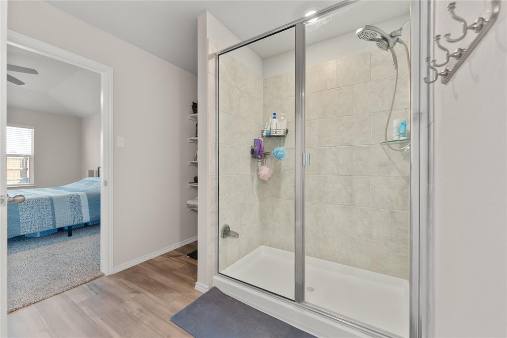 7100 Canadian Drive China Spring, TX 76633 - Photo 11 of 16 a bathroom with a shower and a sink
