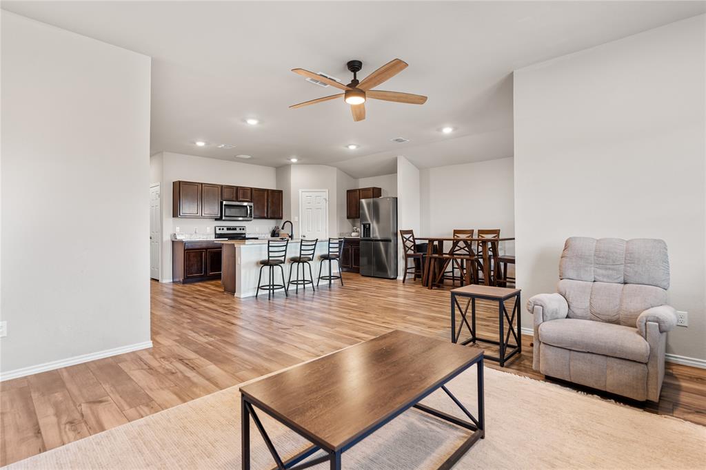 7100 Canadian Drive China Spring, TX 76633 - Photo 7 of 16 a living room with furniture and kitchen view