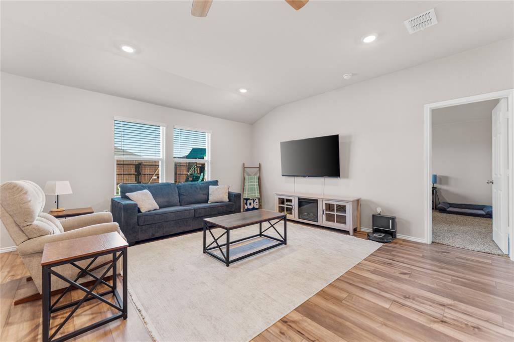 7100 Canadian Drive China Spring, TX 76633 - Photo 8 of 16 a living room with furniture and a flat screen tv