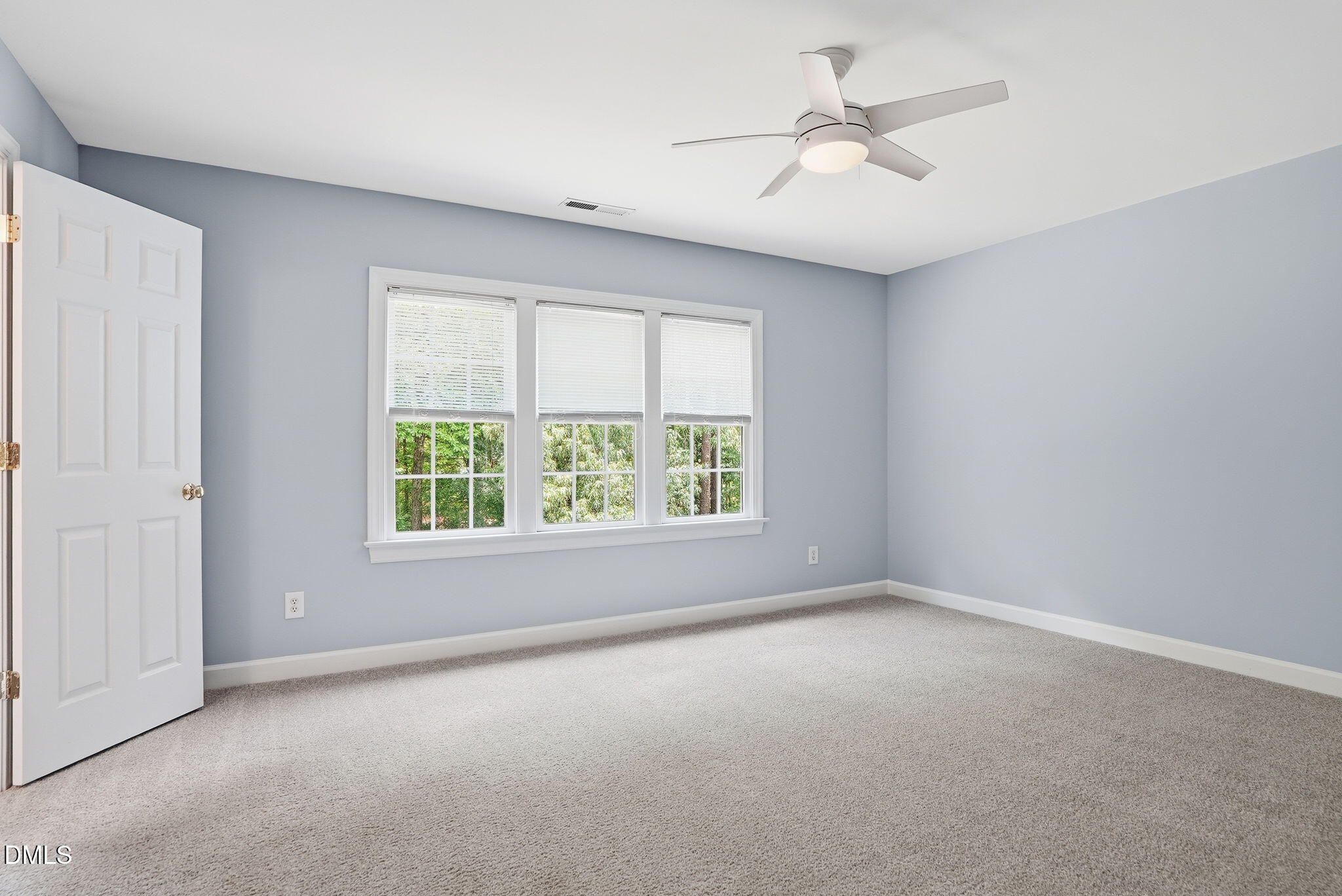 7 Morgans Ridge Lane Durham, NC 27707 - Photo 47 of 75 an empty room with windows and ceiling fan
