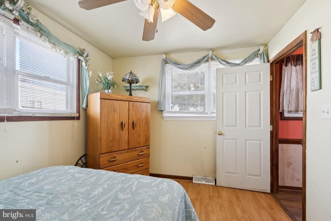 21 Paul Road Maple Shade, NJ 08052 - Photo 17 of 25 a bedroom with a bed dresser and a window