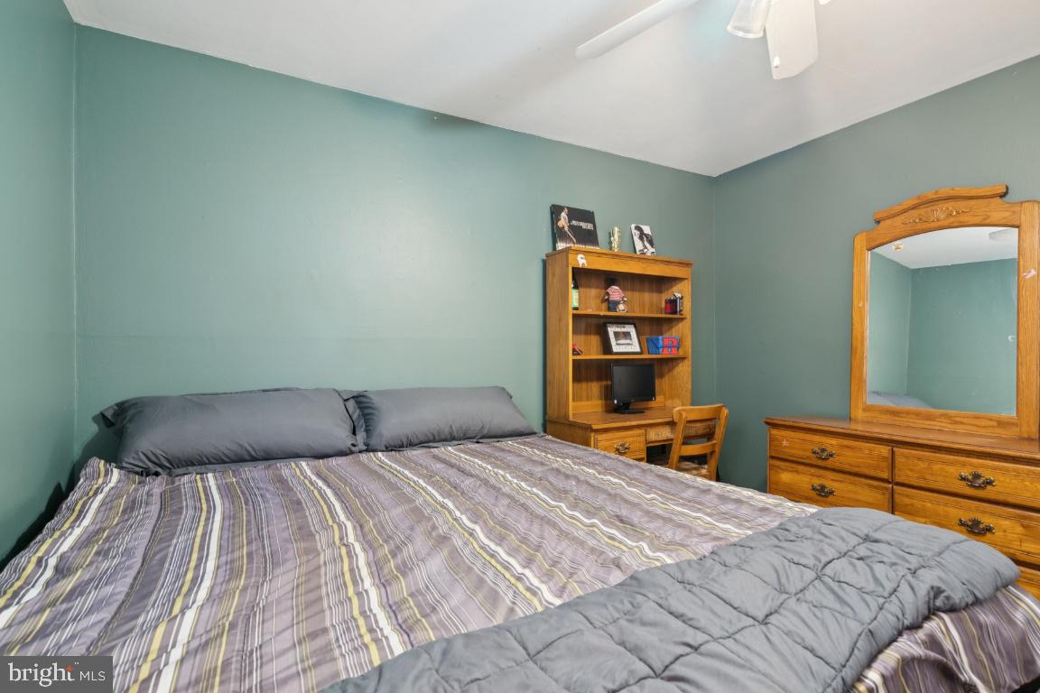 21 Paul Road Maple Shade, NJ 08052 - Photo 19 of 25 a bedroom with a bed and a television