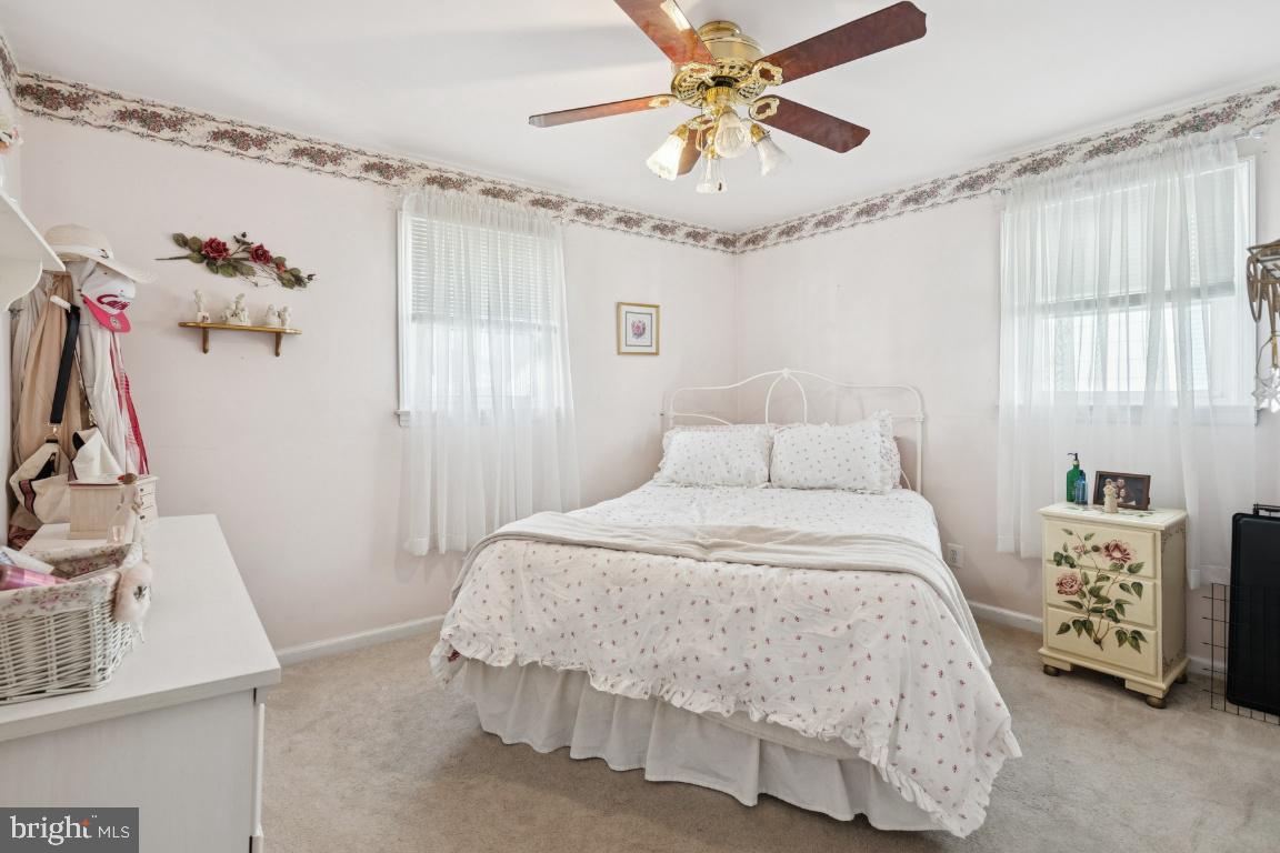 21 Paul Road Maple Shade, NJ 08052 - Photo 20 of 25 a bedroom with a bed and a window