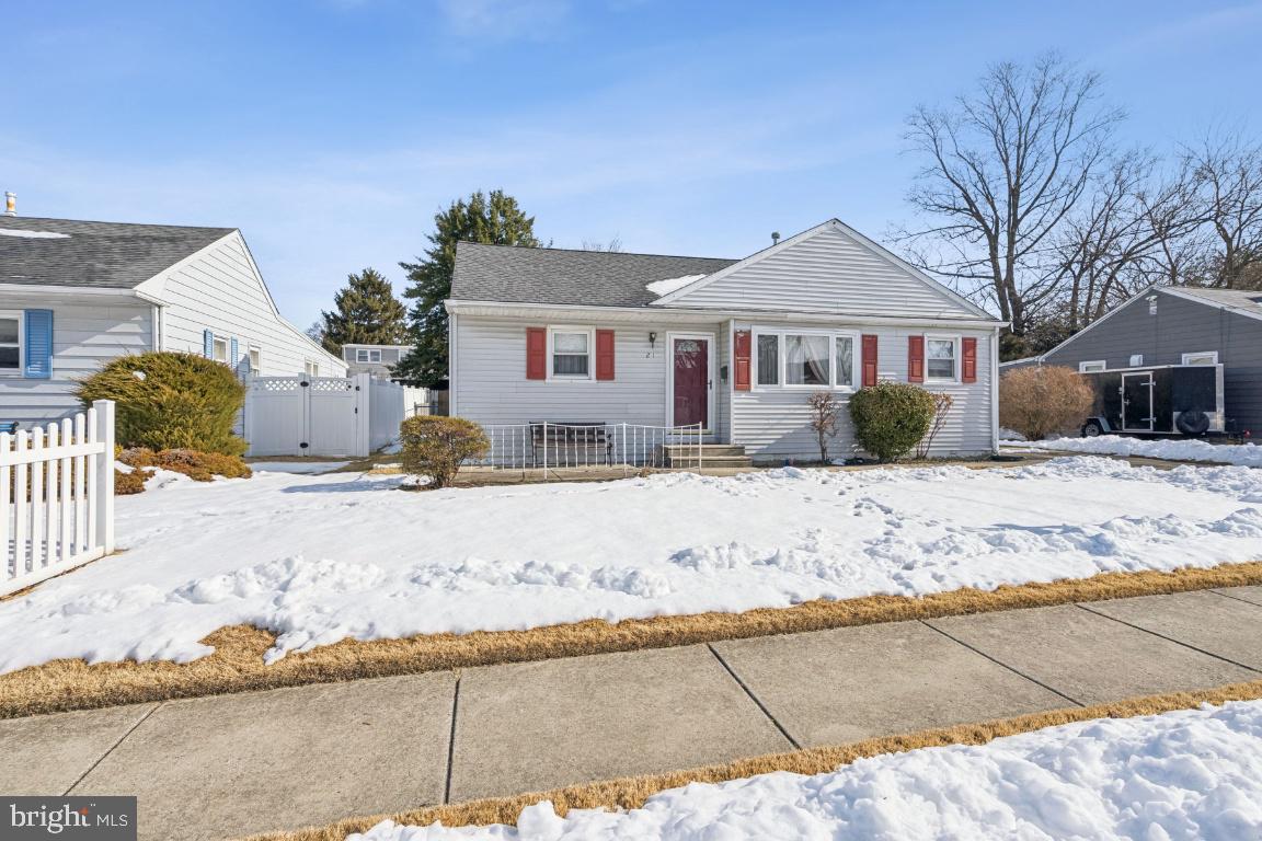 21 Paul Road Maple Shade, NJ 08052 - Photo 2 of 25 a front view of house with yard covered in snow