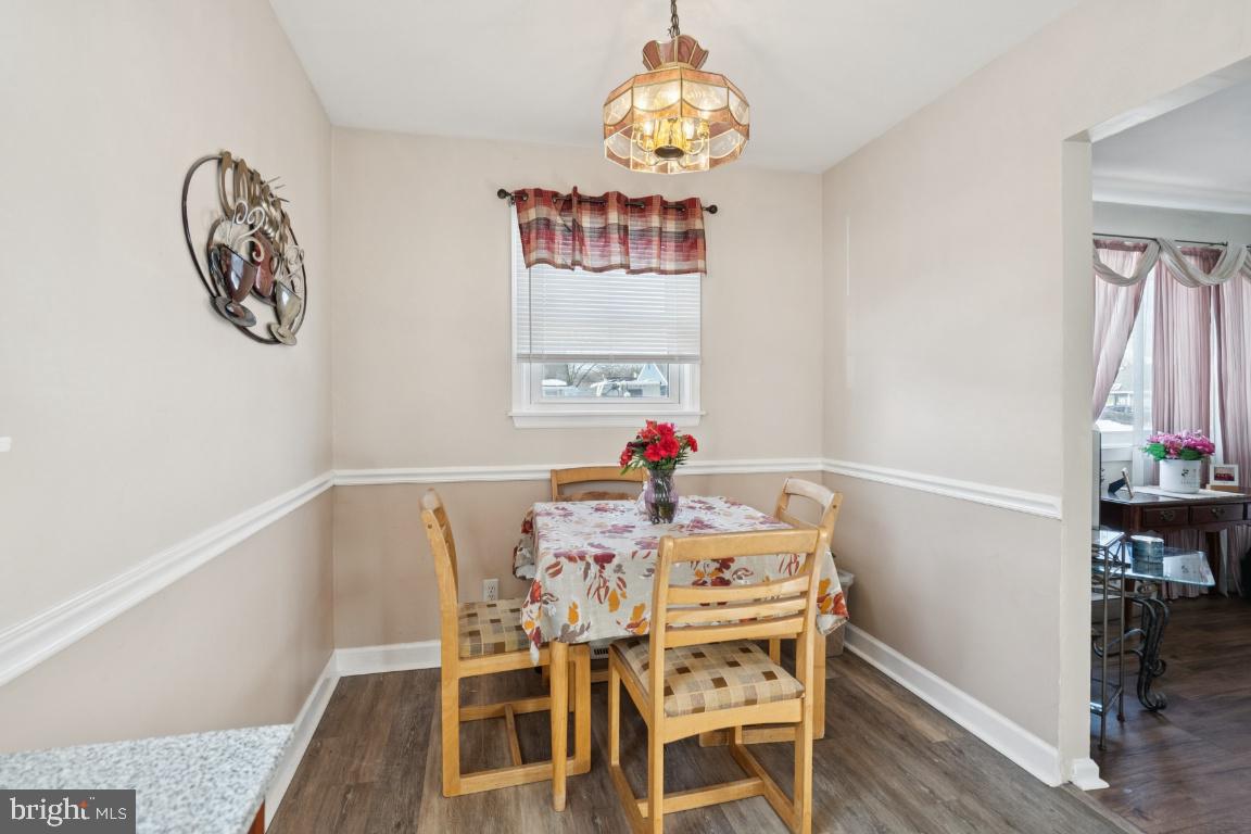21 Paul Road Maple Shade, NJ 08052 - Photo 6 of 25 a view of a dining room with furniture wooden floor and a chandelier