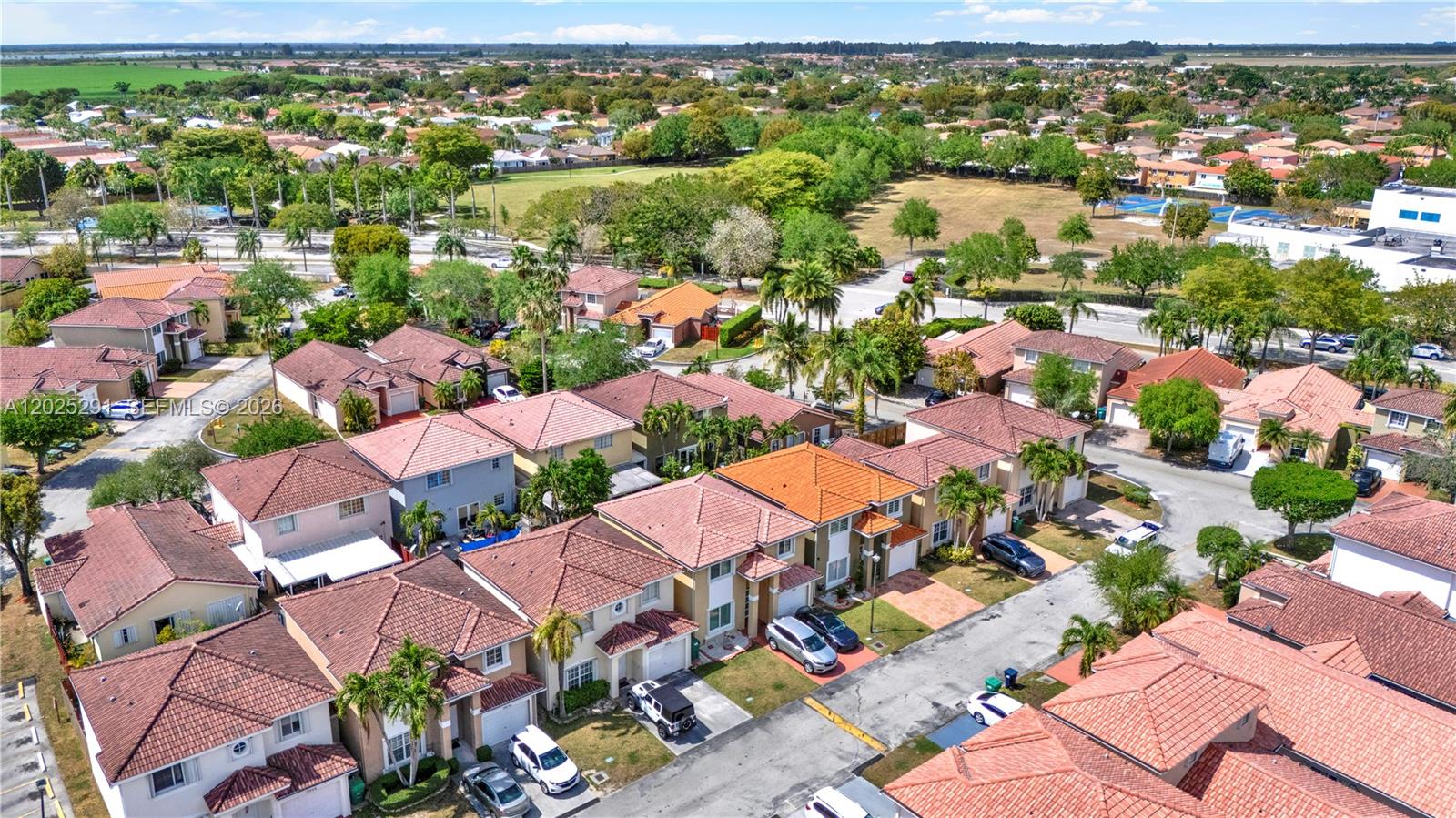 10006 Southwest 162nd Path Miami, FL 33196 - Photo 37 of 40 an aerial view of residential houses with outdoor space