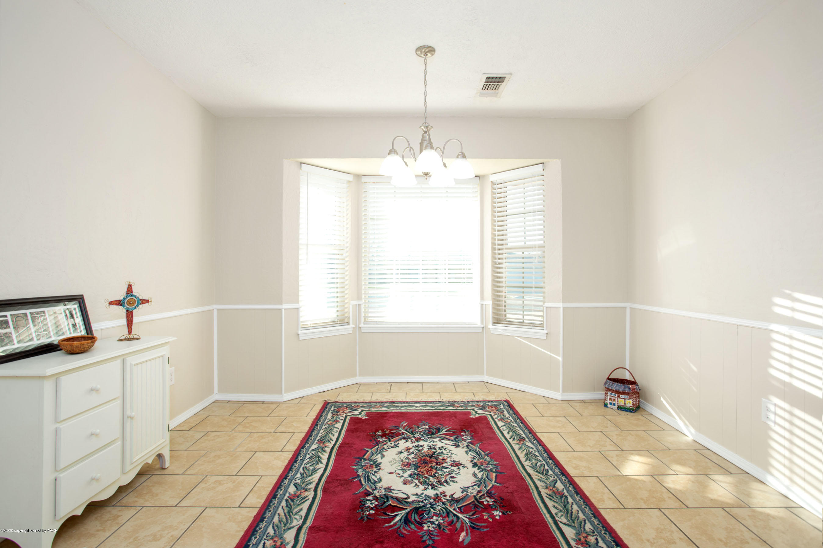 5104 Pin Oak Drive Amarillo, TX 79110 - Photo 11 of 20 a bed room with a bed and a window