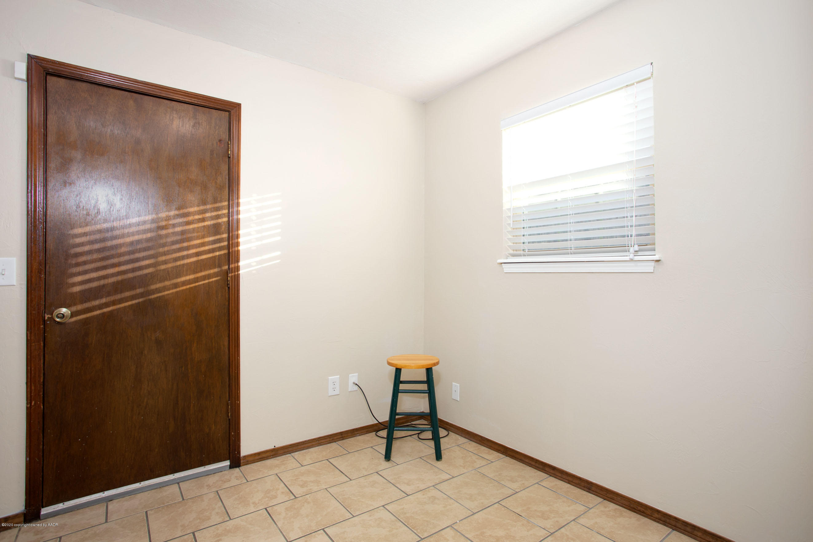 5104 Pin Oak Drive Amarillo, TX 79110 - Photo 12 of 20 a view of a room that has a window in it