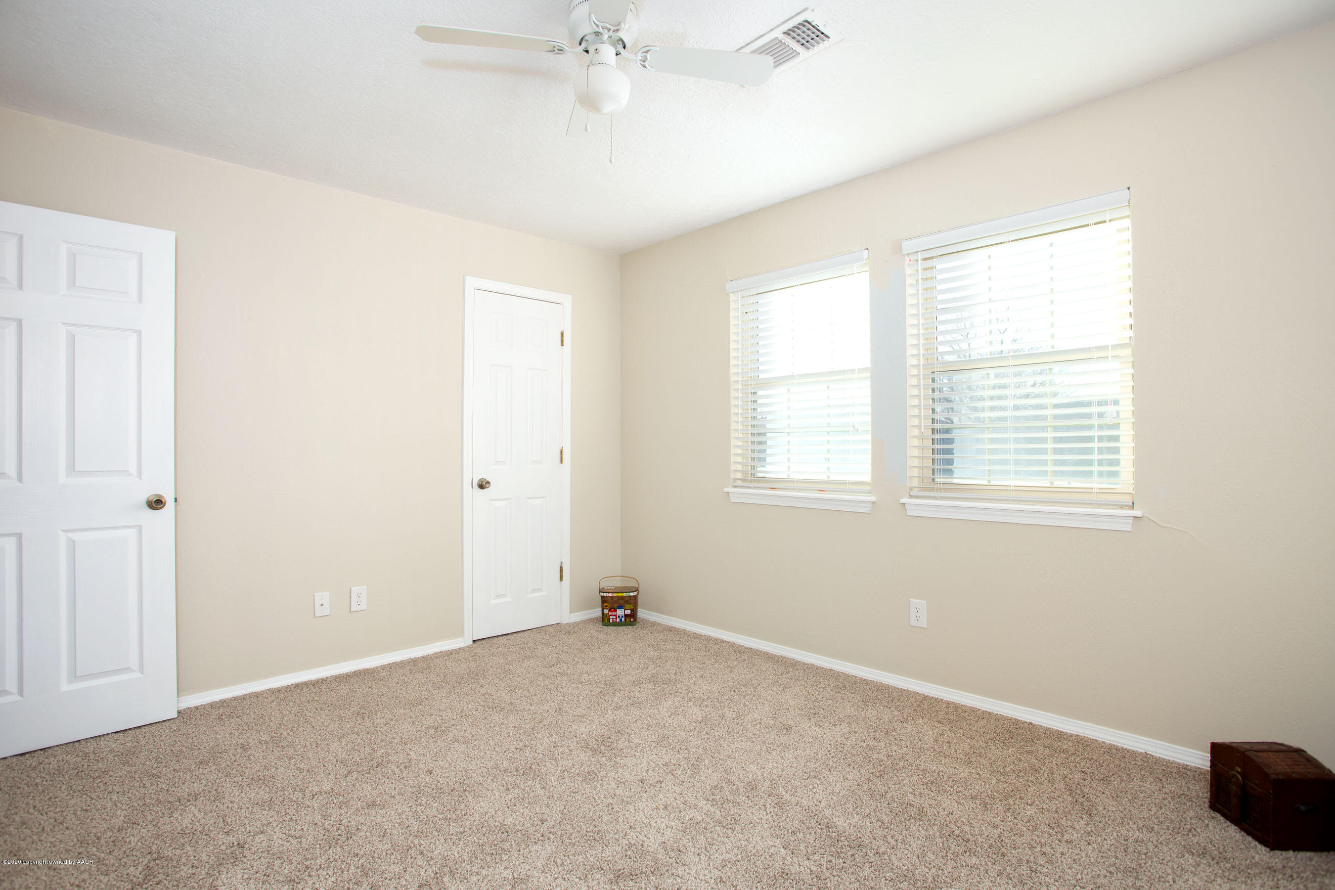 5104 Pin Oak Drive Amarillo, TX 79110 - Photo 16 of 20 a view of an empty room with a window
