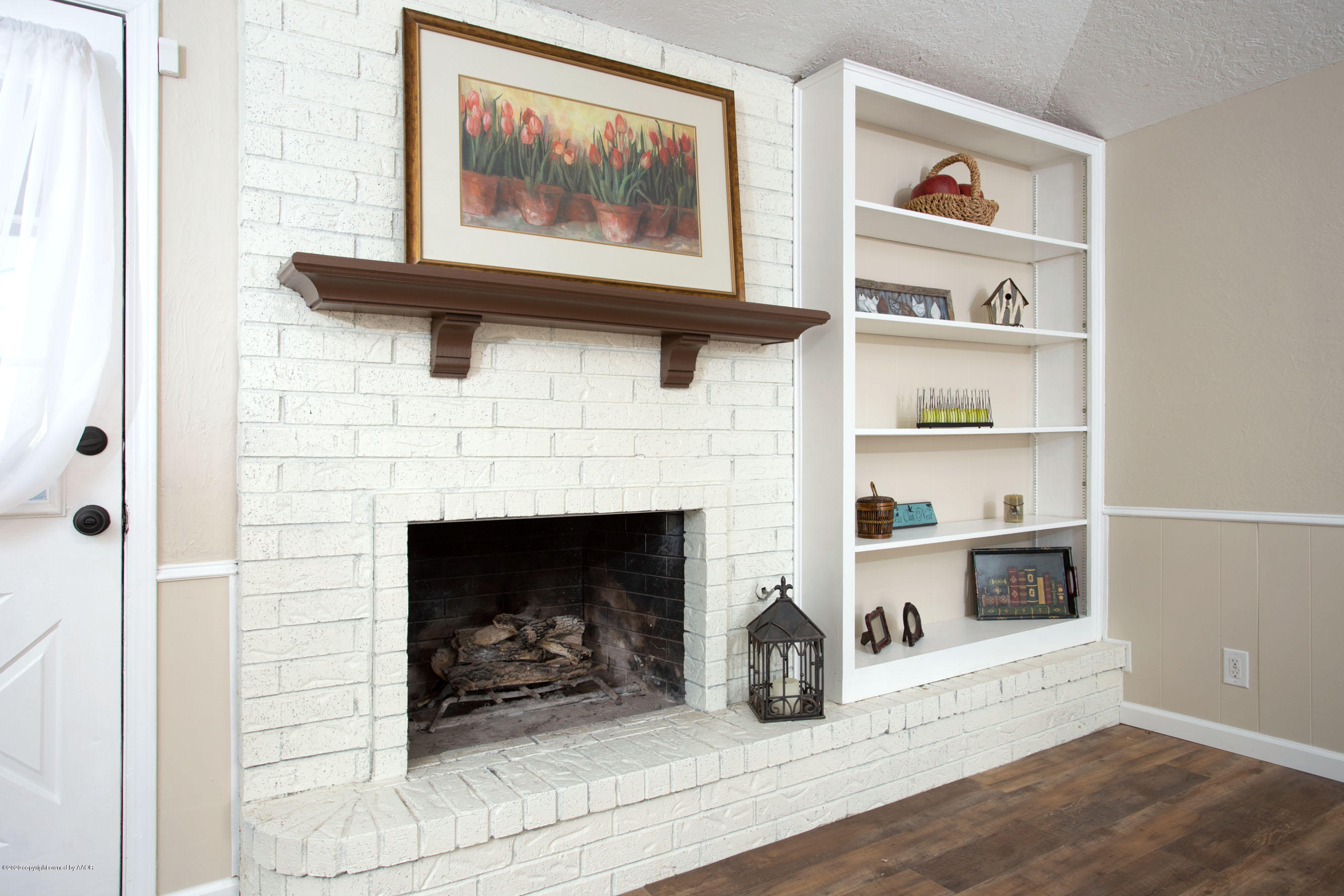 5104 Pin Oak Drive Amarillo, TX 79110 - Photo 3 of 20 a living room with furniture and a fireplace