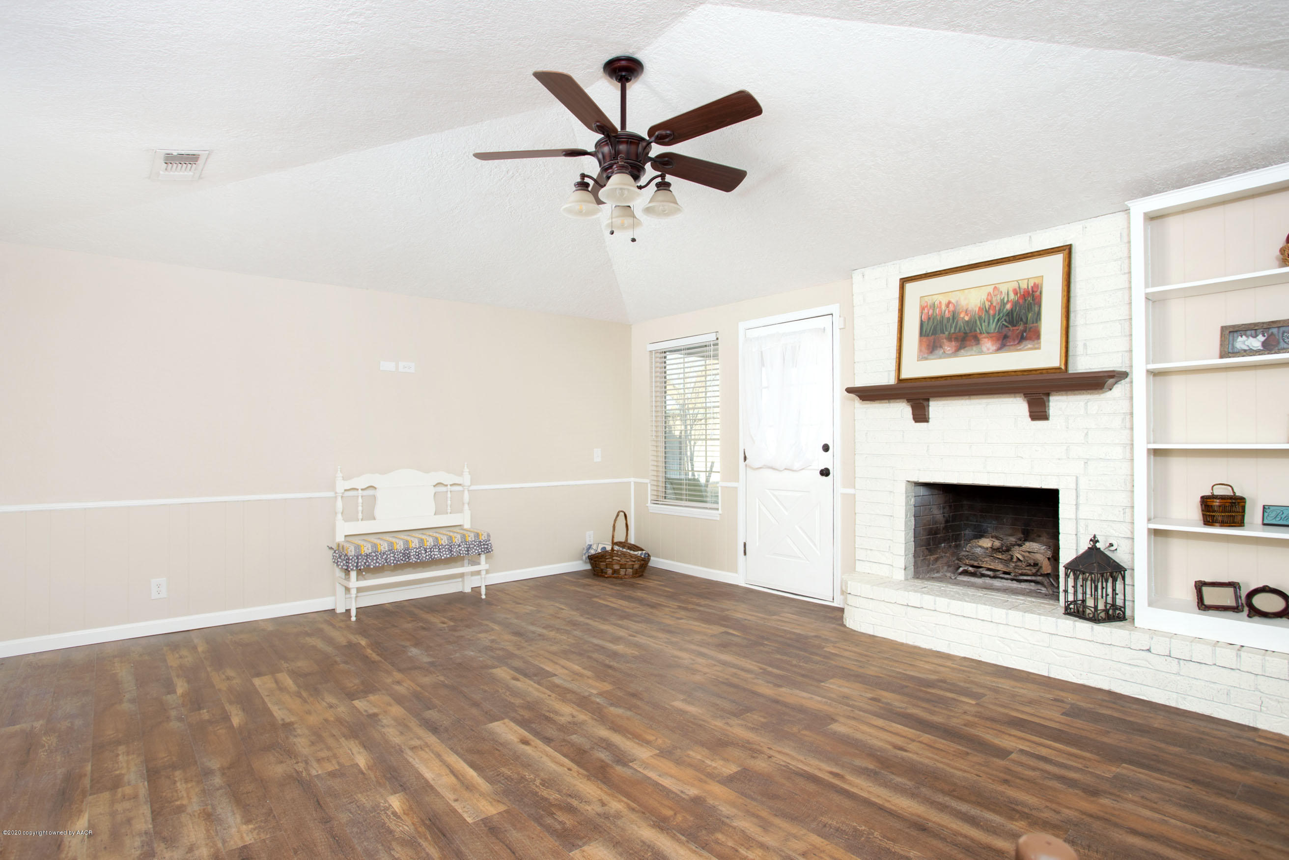 5104 Pin Oak Drive Amarillo, TX 79110 - Photo 4 of 20 a living room with furniture and a fireplace