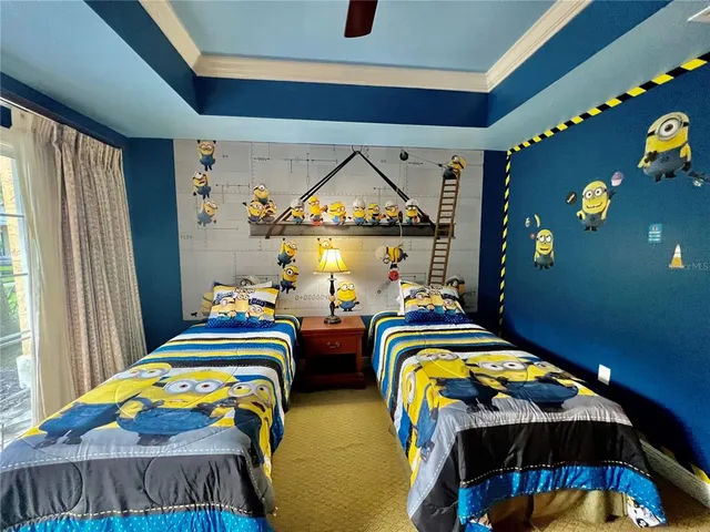 a bedroom with bed and window