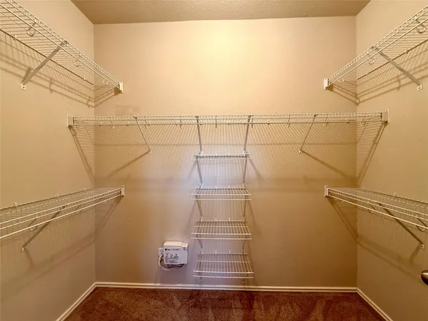 a view of a balcony with wooden floor