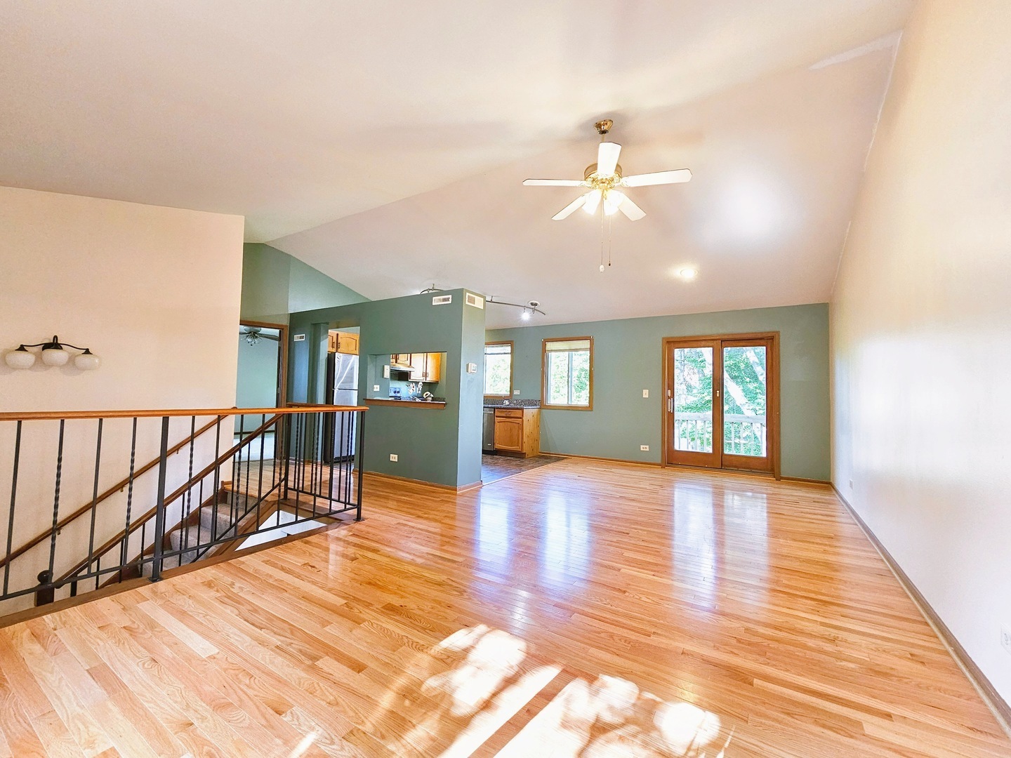 2434 Red Bud Court Aurora, IL 60502 - Photo 5 of 16 wooden floor in an empty room with a window