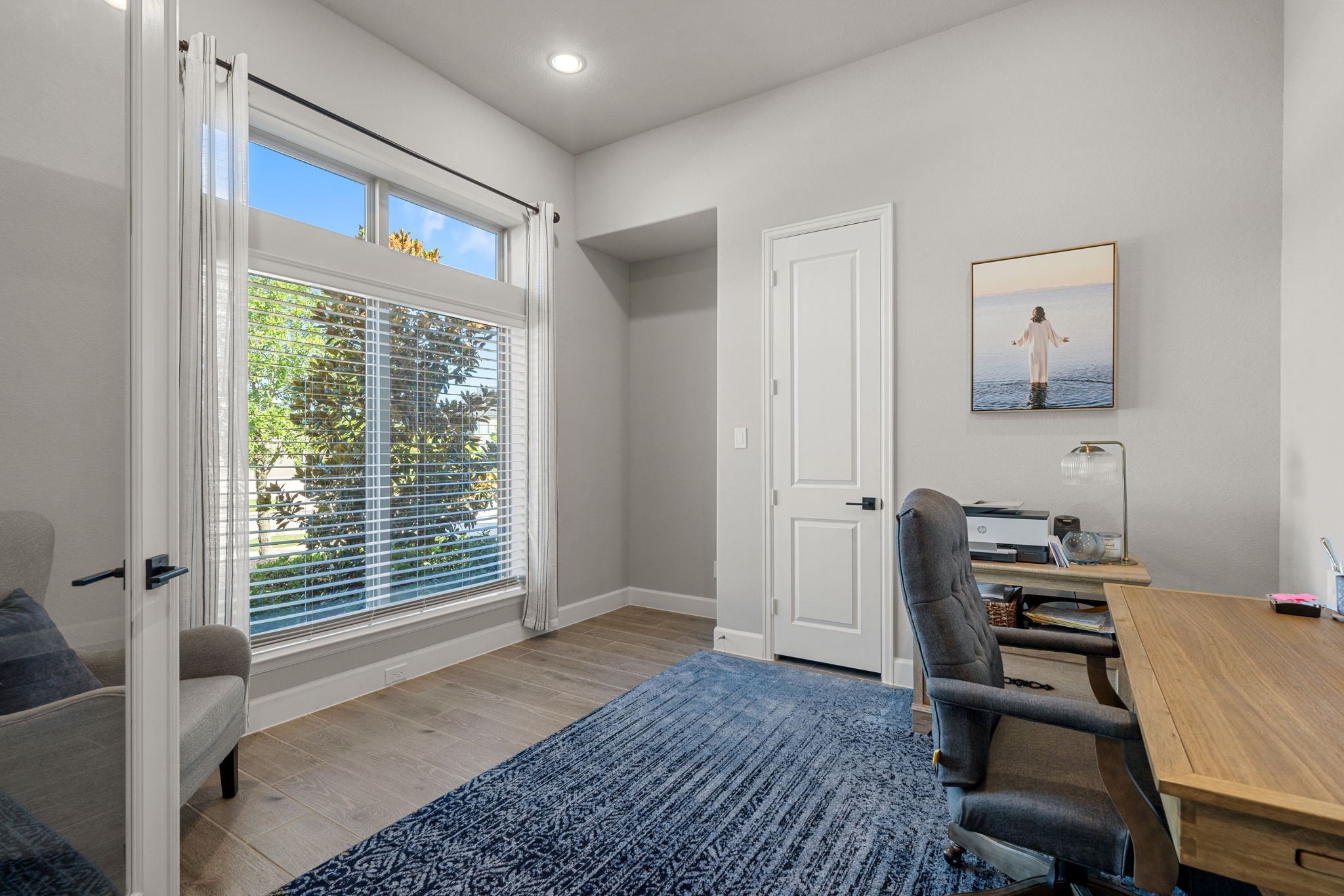 29726 Smoky Ridge Road Fulshear, TX 77441 - Photo 13 of 43 a bedroom with a bed and a window