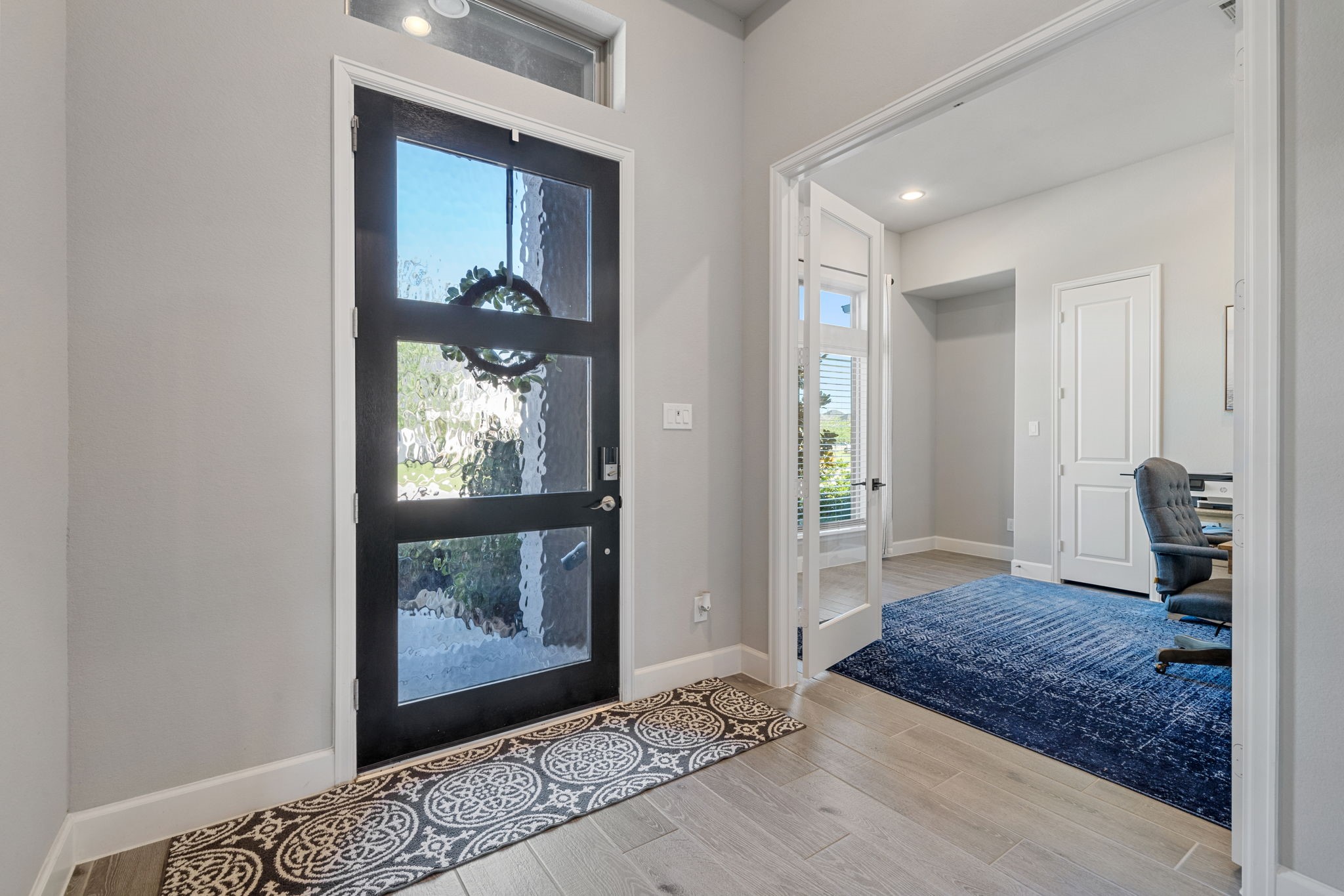 29726 Smoky Ridge Road Fulshear, TX 77441 - Photo 17 of 43 a bedroom with a bed and a window