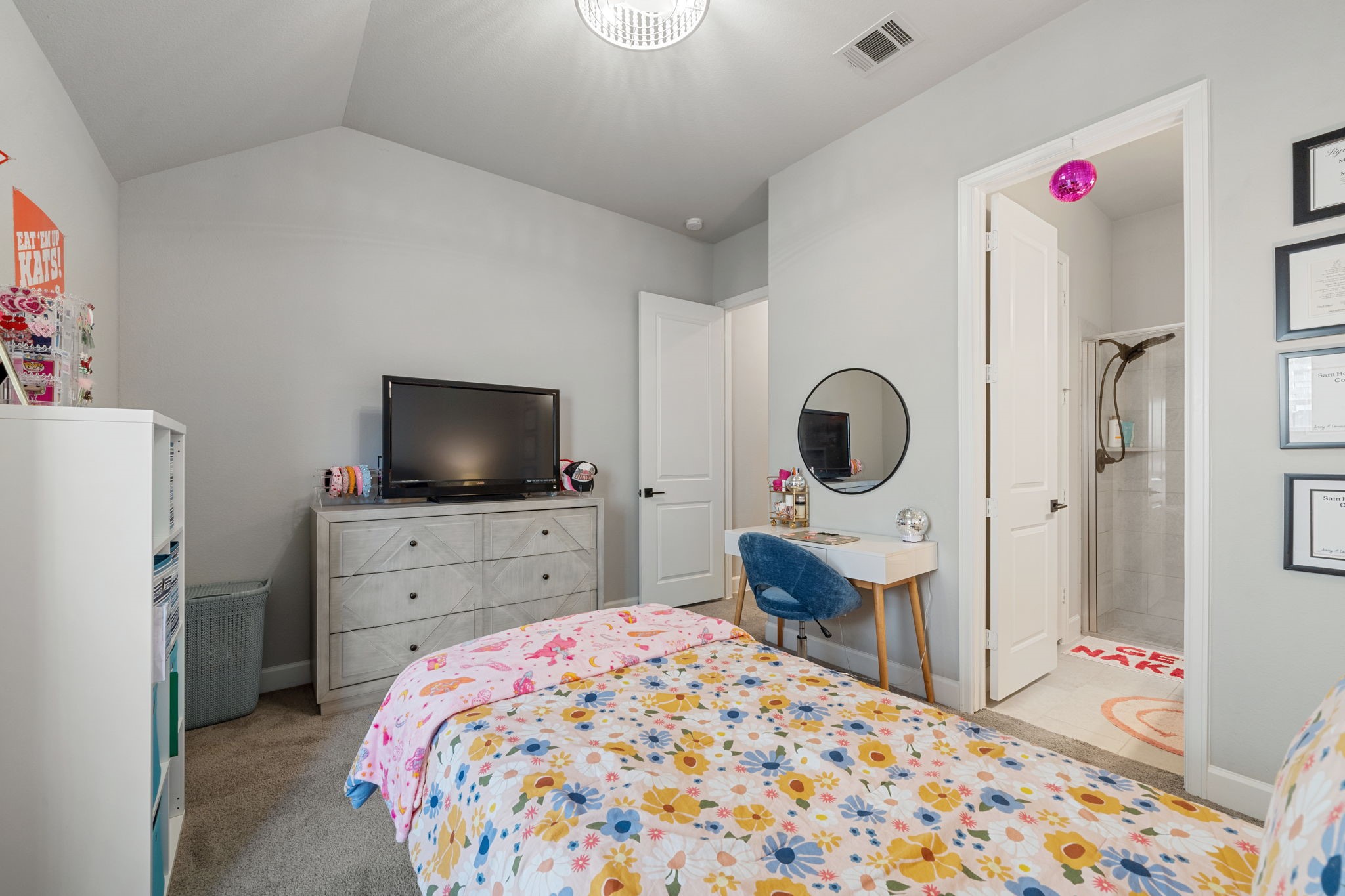 29726 Smoky Ridge Road Fulshear, TX 77441 - Photo 20 of 43 a bedroom with a bed and a flat screen tv