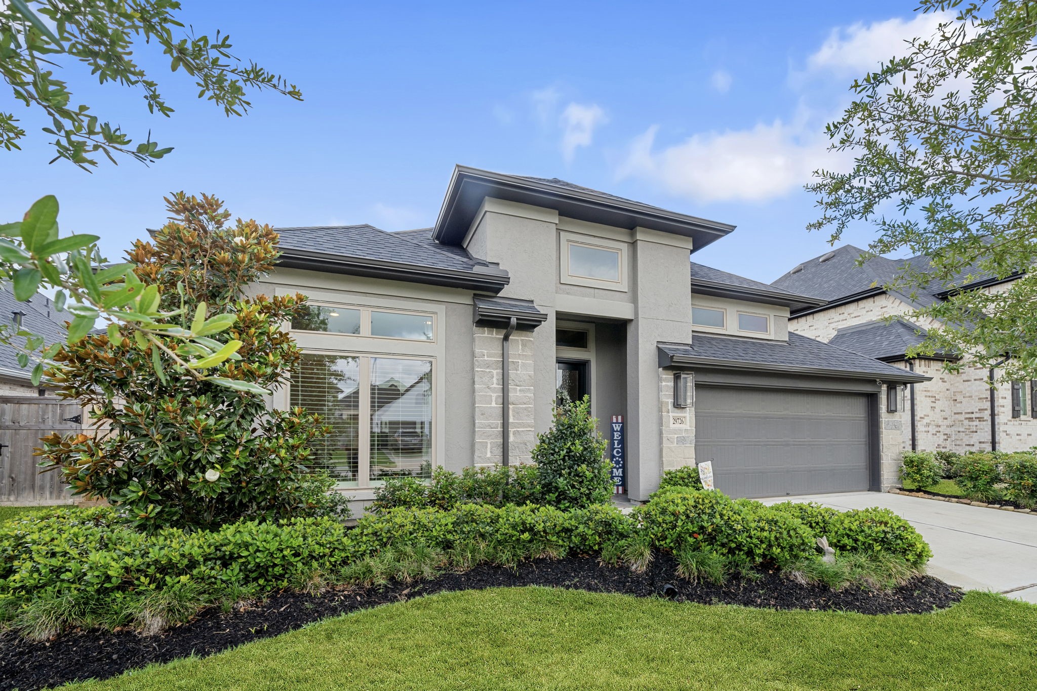29726 Smoky Ridge Road Fulshear, TX 77441 - Photo 41 of 43 front view of a house with a yard