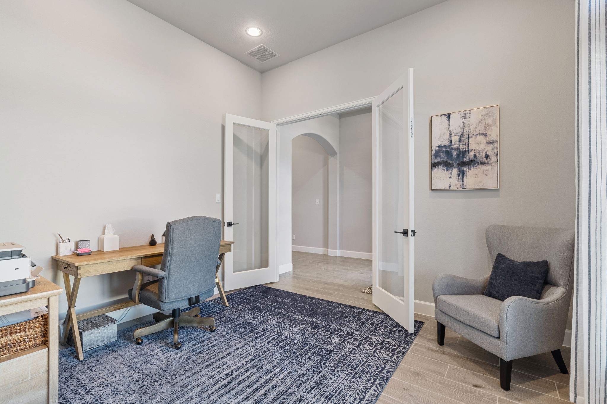 29726 Smoky Ridge Road Fulshear, TX 77441 - Photo 6 of 43 a view of a workspace with furniture and a rug