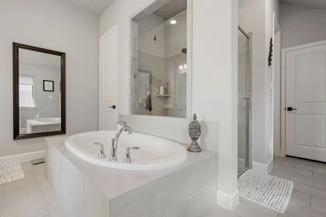 a view of a pathway of the house front of a house