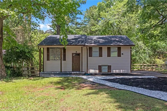 a house view with a garden space