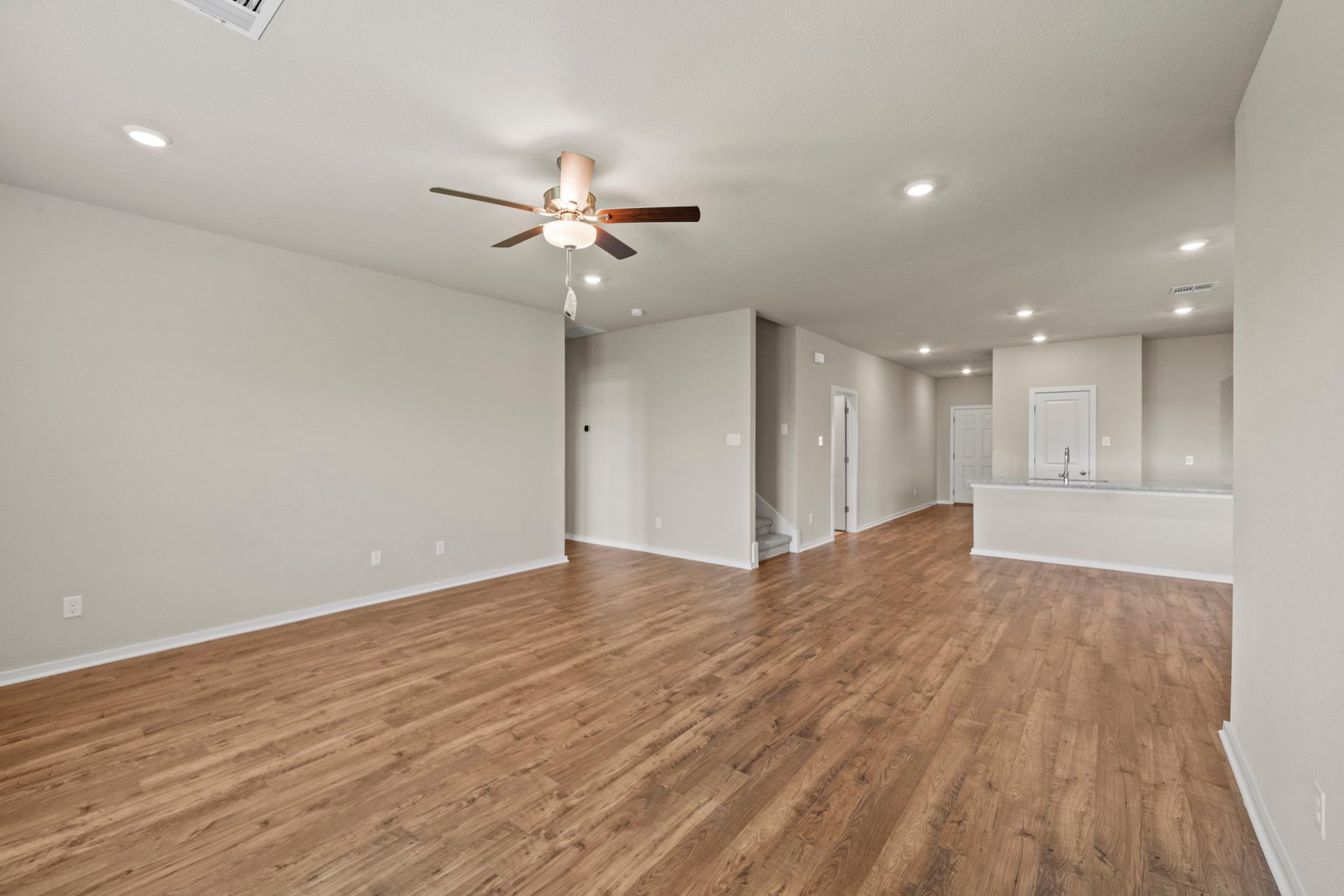 172 Wind Hill Jarrell, TX 76537 - Photo 16 of 30 From Family Room to Open Concept Kitchen