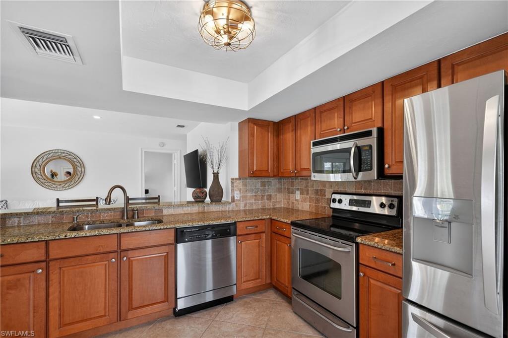 523 Club Side Drive, Unit 2523 Naples, FL 34110 - Photo 8 of 33