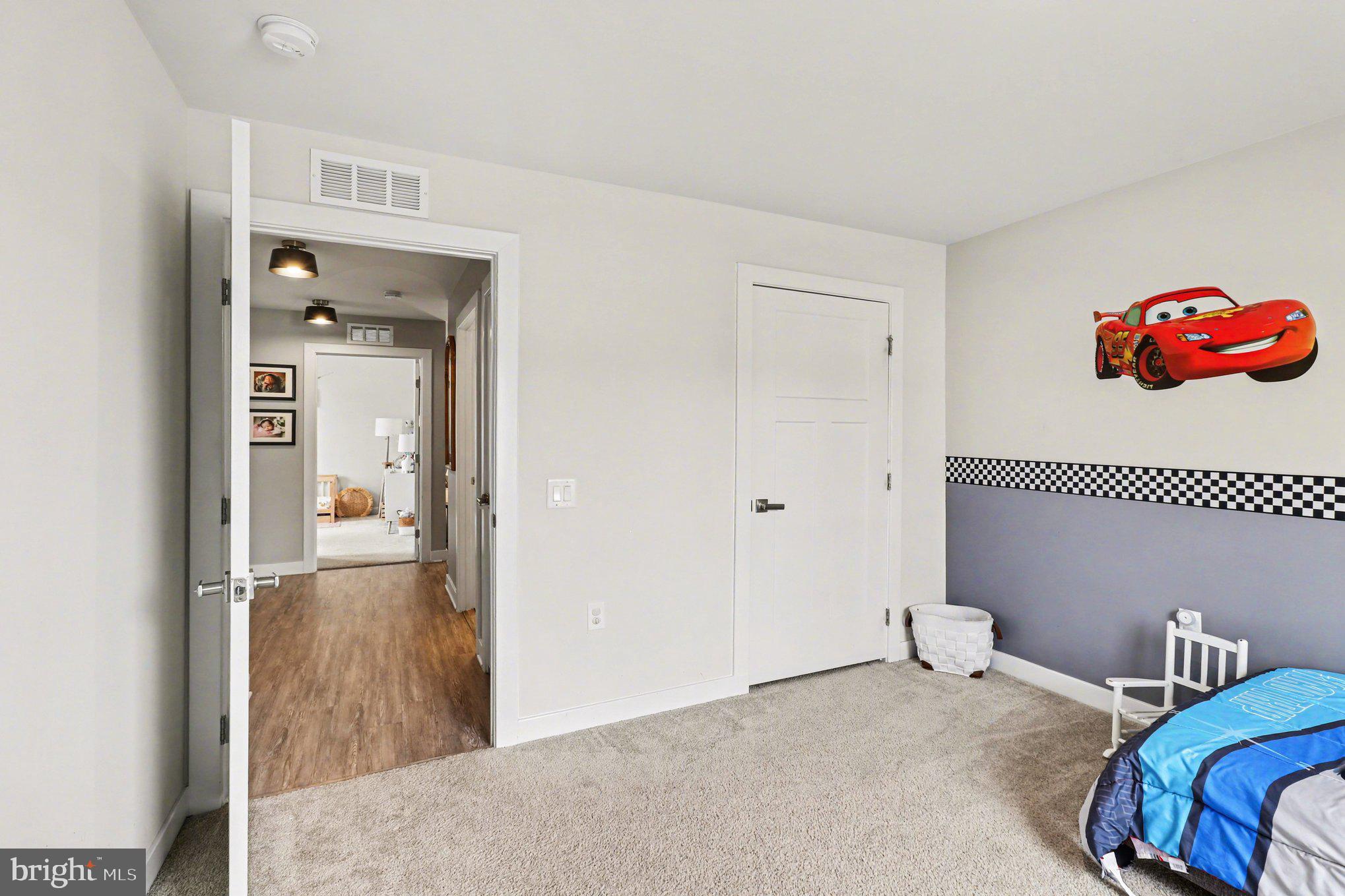 7202 Parchment Circle Ruther Glen, VA 22546 - Photo 20 of 30 a bedroom with a bed and a window