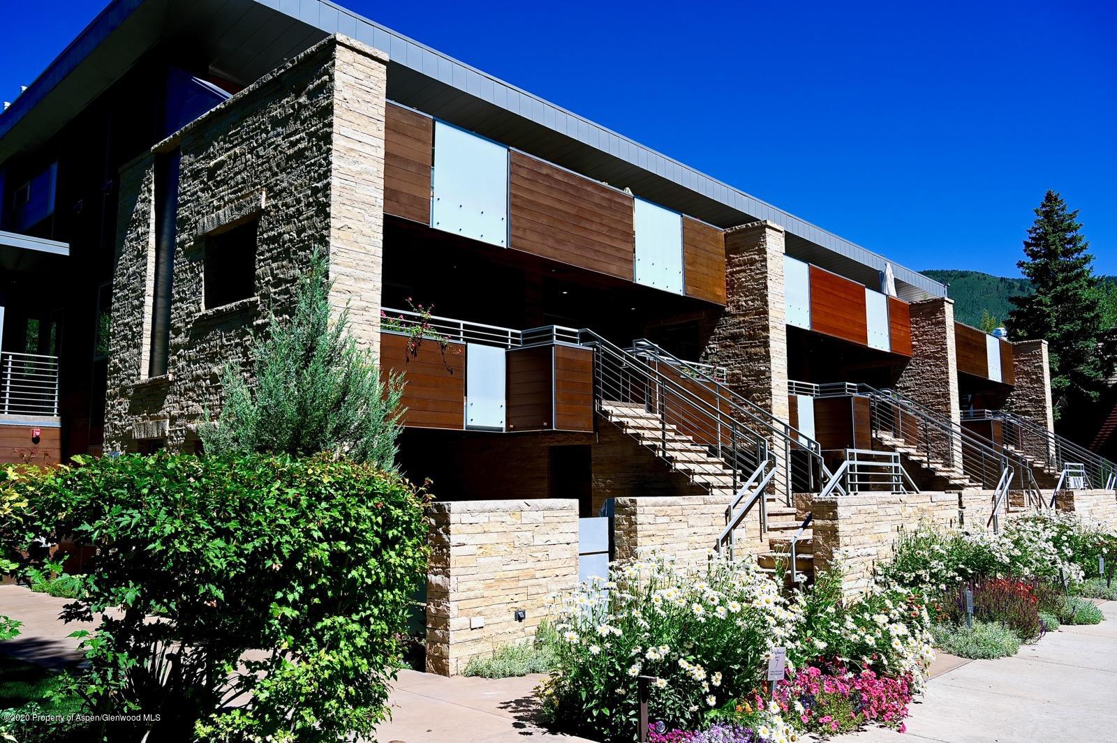 100 East Cooper Avenue, Unit 12 Aspen, CO 81611 - Photo 12 of 12 a front view of a house with a street