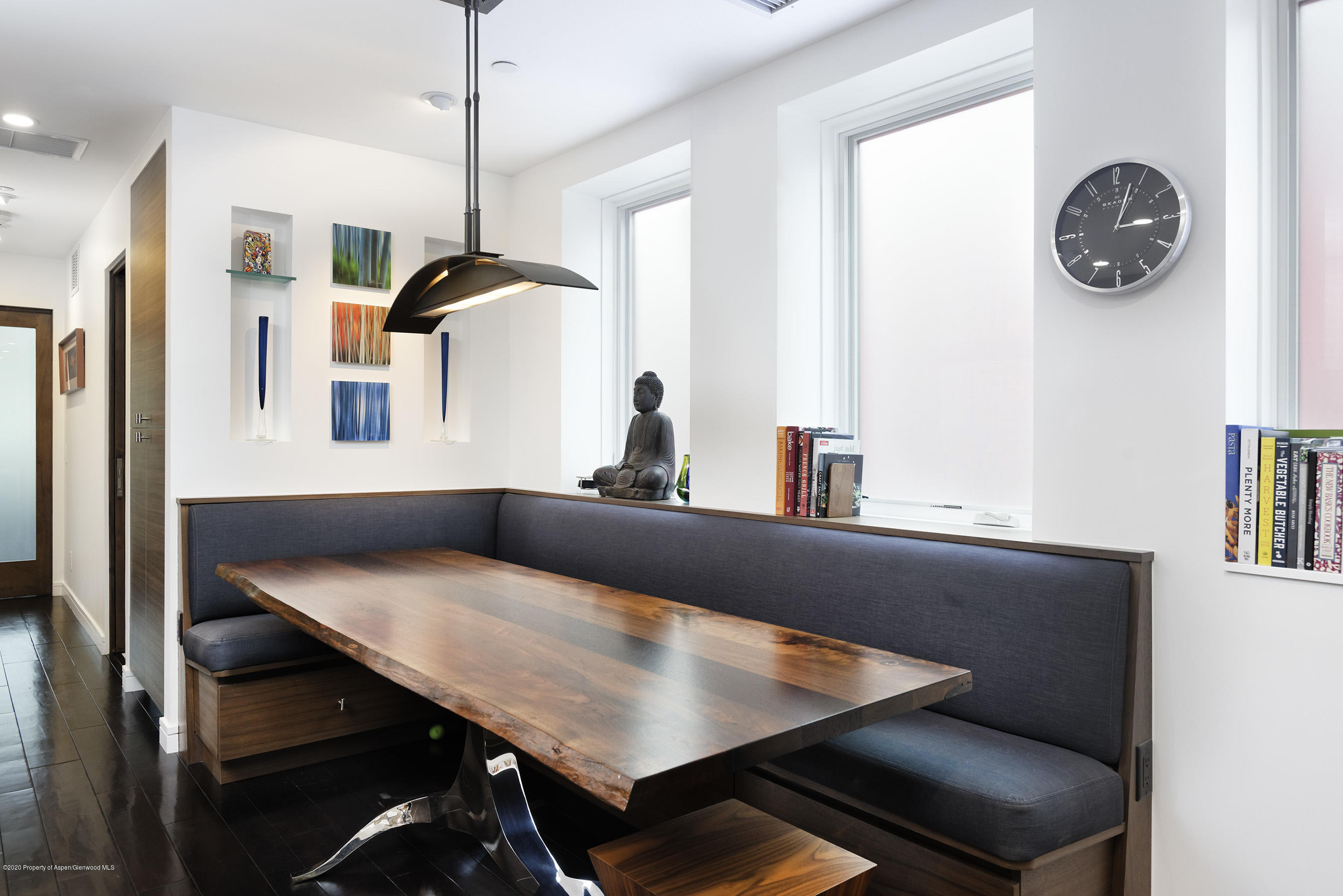 100 East Cooper Avenue, Unit 12 Aspen, CO 81611 - Photo 5 of 12 a view of a room with a table and chairs