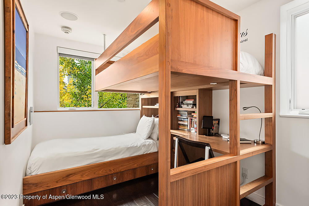 100 East Cooper Avenue, Unit 12 Aspen, CO 81611 - Photo 9 of 12 a living room with furniture
